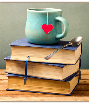 Coffee mug on stack of books